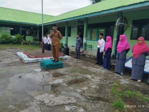 Kades Marhasan Abdullah Kembali ke MTs Aswaja Pontianak Sebagai Pembina Upacara