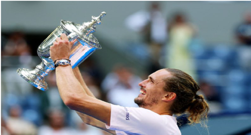  Petenis Jerman Alexander Zverev Ben Shelton pada final US Open 2026. Kemenangan ini membuat Zverev untuk kedua kalinya memenangi titel Grand Slam dalam kariernya.